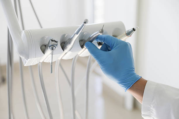 Professional Tooth Extraction technician working in Powells Crossroads, TN